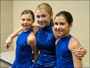 Skaters from the St. Cloud area bond at Thursday's training session. From the left are Remington Deyak, 11, Nicole Loberg, 13, and Katie Williams, 11.
