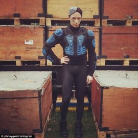 Stand out: Champion figure skater Johnny Weir was game for a laugh in black Lycra tights, padded sweater and football fascinator